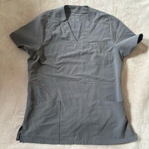 Jaanuu “Helia Slim Notched V-Neck” Scrub Top